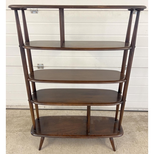 1338 - A vintage 1960's Ercol dark wood room divider with 5 curved edge shelves. Raised on 4 small splayed ... 