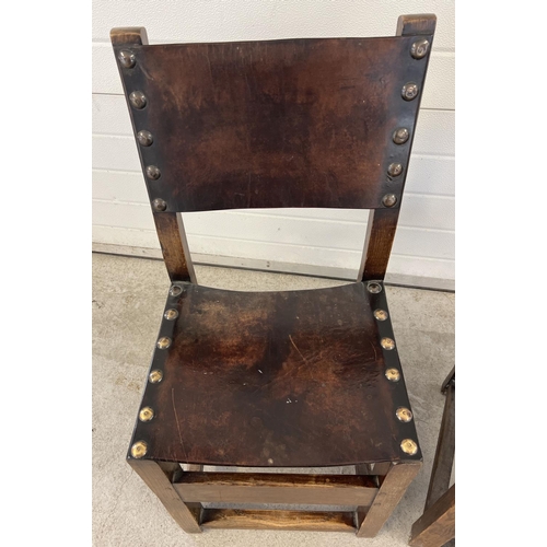 1340 - 2 dark oak Arts & Crafts style wooden block chairs with leather backs and seats. Large brass stud de... 