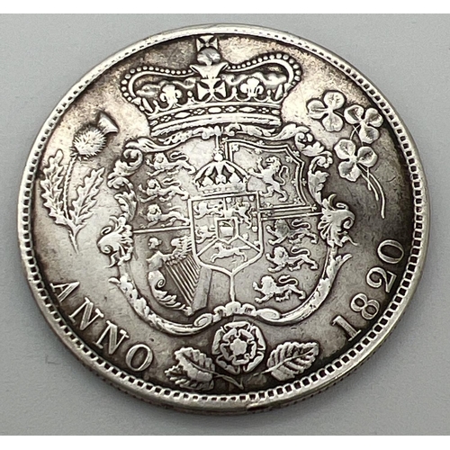 6 - A George IIII silver half crown, dated 1820, in a Victorian silver brooch mount. Crown shield of arm... 