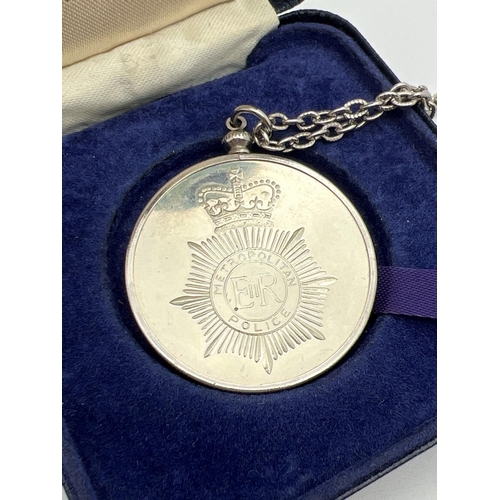 29 - A boxed limited edition solid nickel silver Metropolitan Police 150th anniversary commemorative meda... 