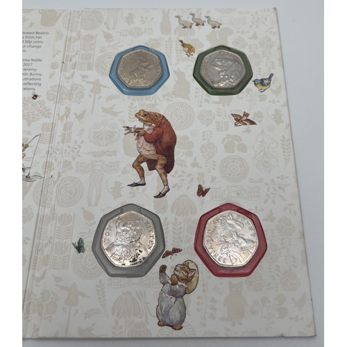 35 - A 2017 The Beatrix Potter 50p Coin Collector Album by The Royal Mint. Folder contains 4 x 50p coins,... 