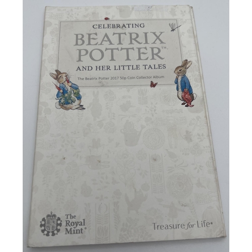 35 - A 2017 The Beatrix Potter 50p Coin Collector Album by The Royal Mint. Folder contains 4 x 50p coins,... 