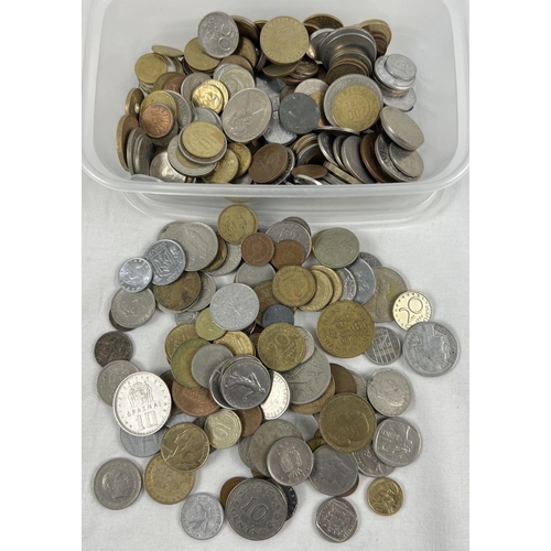 64 - A small tub of vintage British and foreign coins. To include examples from Portugal, Costa Rica, Spa... 