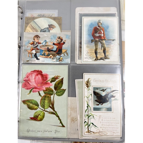 162 - An album containing 88 assorted Victorian & Edwardian greetings cards. In varying styles, sizes and ... 