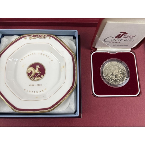 68 - A boxed Imperial Tobacco centenary coin/medal and dish set as gifted to employees in 2001. Box set c... 