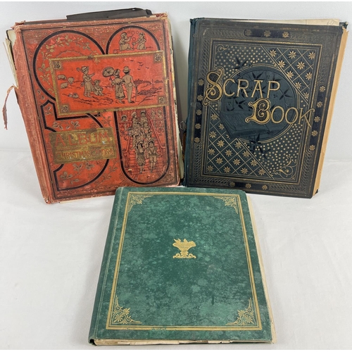 183 - 3 late Victorian/Edwardian scrap albums containing scraps, greetings cards, prints and pressed leave... 