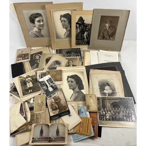 188 - A box of assorted vintage photographs, portraits, cabinet cards and photographic negatives. Mostly b... 