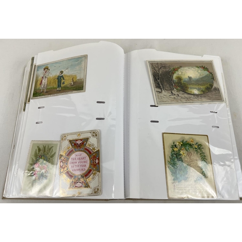 190 - A large album containing 163 assorted Victorian and Edwardian greetings cards. In varying shapes, st... 