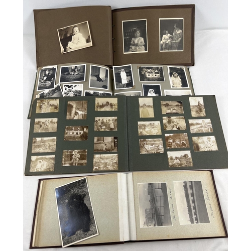 193 - 4 assorted vintage 1930's photograph albums containing a quantity of assorted black & white photos.