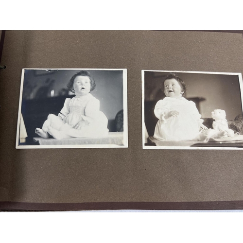 193 - 4 assorted vintage 1930's photograph albums containing a quantity of assorted black & white photos.