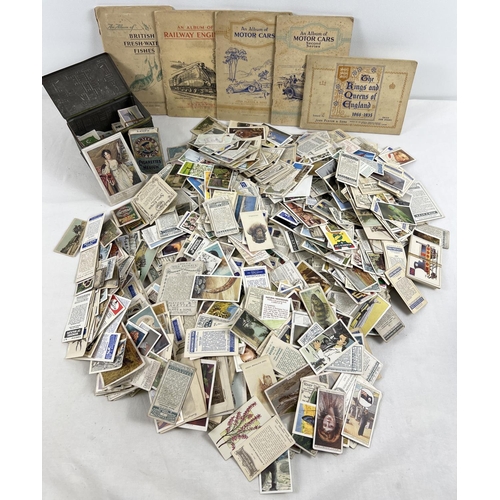 195 - A box containing a large quantity of assorted vintage cigarette cards together with 5 albums (4 comp... 