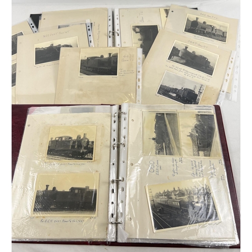 196 - 2 albums of vintage black and white photographs of steam trains.