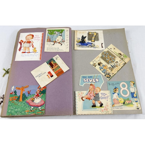 198 - An album containing 230+ assorted Victorian & Edwardian greetings cards. Each card fixed onto scrap ... 