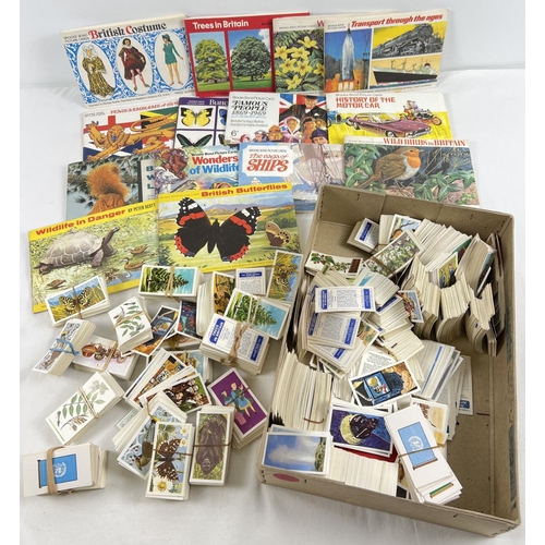 200 - A collection of assorted vintage Brooke Bond tea cards together with 14 assorted collectors albums.