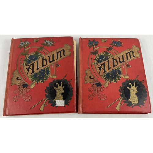 206 - 2 Victorian red scrap albums with gilt detail to front covers. Containing a quantity of greetings ca... 