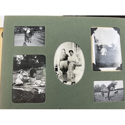 207 - 4 vintage photograph albums containing a quantity of assorted vintage black & white and colour photo... 