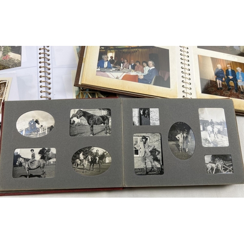 207 - 4 vintage photograph albums containing a quantity of assorted vintage black & white and colour photo... 