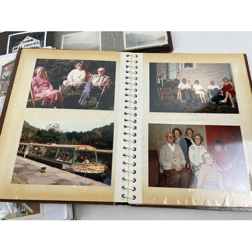 207 - 4 vintage photograph albums containing a quantity of assorted vintage black & white and colour photo... 