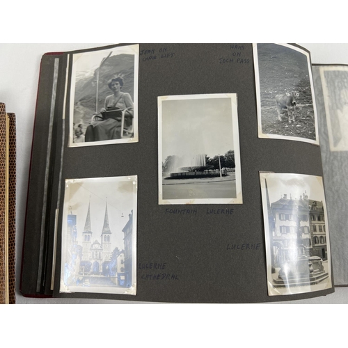 207 - 4 vintage photograph albums containing a quantity of assorted vintage black & white and colour photo... 