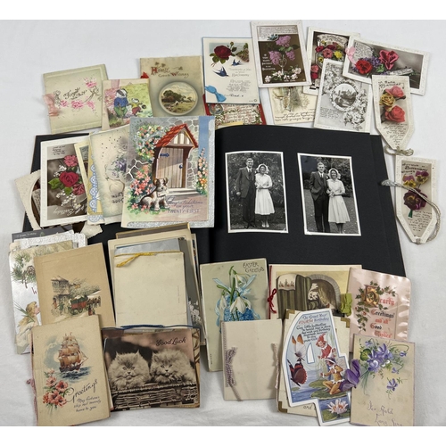 214 - A box of approx. 60 assorted Victorian & vintage greetings cards, together with a vintage album of p... 