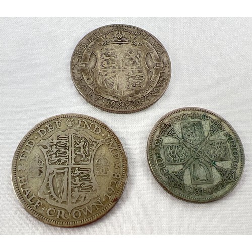 12 - 3 George V half silver coins. A 1924 half crown, 1928 half crown and a 1931 florin.