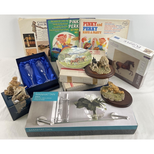 1303 - A box of mixed items to include resin animal figurines, collectors plates depicting rural scenes and... 