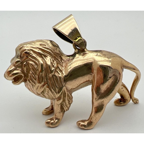 105 - A 9ct gold pendant modelled as a lion, with hanging bale. Fully hallmarked to reverse. Approx. 2.5cm...