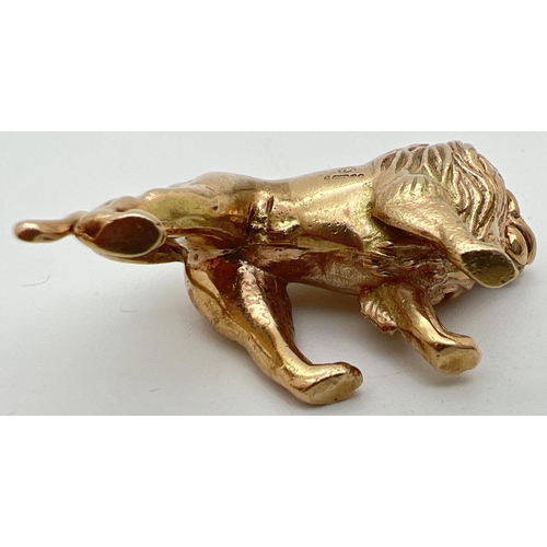 105 - A 9ct gold pendant modelled as a lion, with hanging bale. Fully hallmarked to reverse. Approx. 2.5cm... 