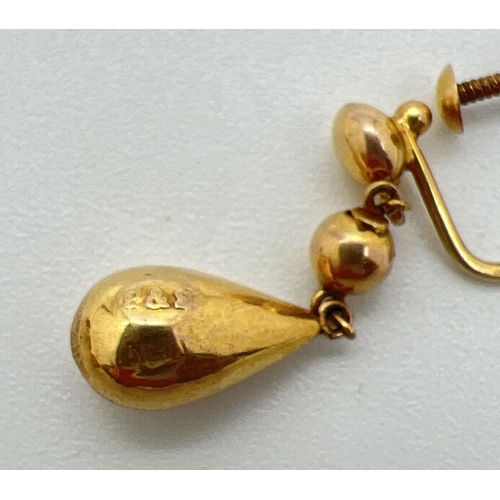 1046 - A pair of vintage 9ct gold screw back teardrop drop style earrings. Makers and gold mark to both. Dr... 