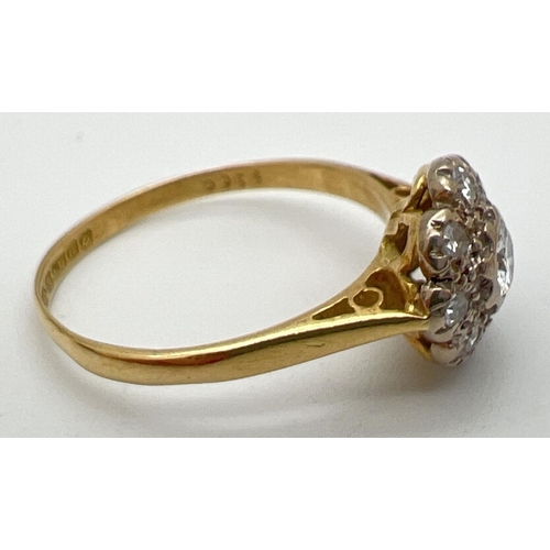 1001 - A vintage 18ct gold diamond cluster style ring set with 9 round cut diamonds. Total diamond approx. ... 