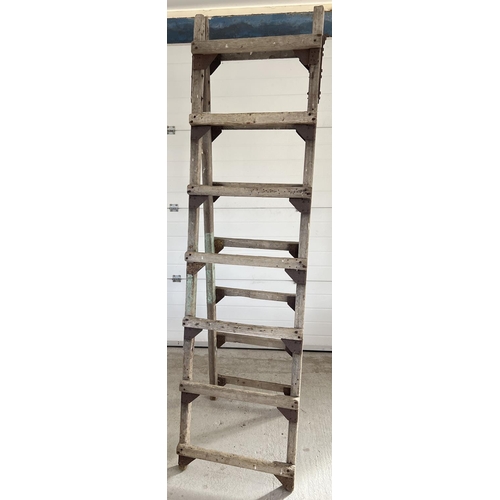 1340 - A large vintage wood folding decorators trestle, ideal display item. Approx. 216cm tall x 59cm wide.