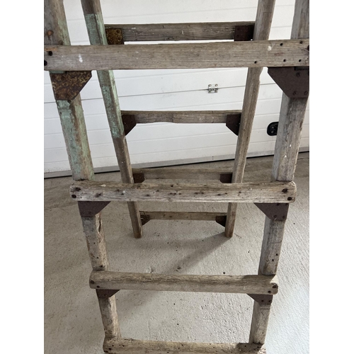 1340 - A large vintage wood folding decorators trestle, ideal display item. Approx. 216cm tall x 59cm wide.