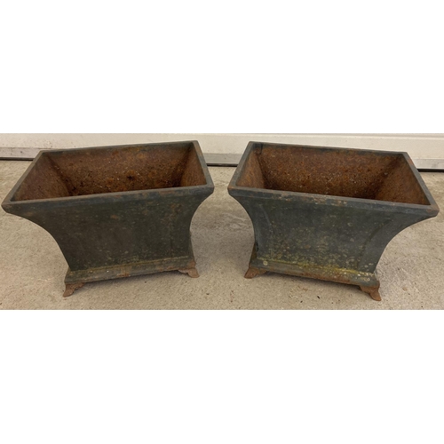 1326 - A pair of rectangular shaped cast iron 4 footed planters. Each approx. 28cm tall x 40cm long x 28cm ... 