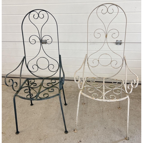 1327 - A pair of vintage metal decorative garden arm chairs, painted different colours. Approx. 113cm tall.