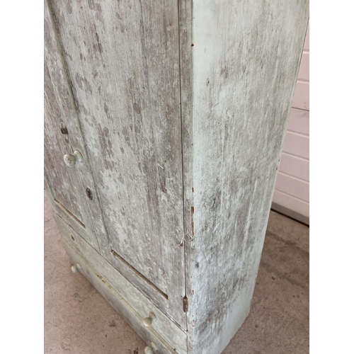 1328 - A vintage pine 2 door cupboard with 2 drawers to base, painted pale blue/green. 2 interior shelves, ... 