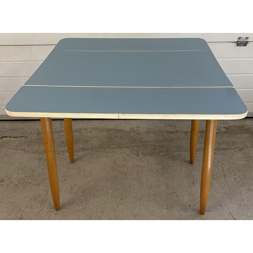 1341 - A retro mid century pale blue Formica topped, drop leaf kitchen table with 4 matching chairs. Table ... 