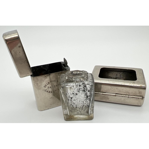 1268 - An early 20th century De La Rue & Cos travelling casket inkwell. Nickel plated inkwell with hinged l... 