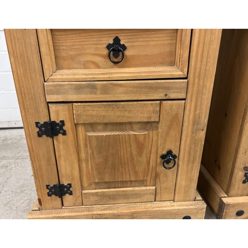 1342 - A pair of Mexican pine bedside cabinets with single drawer and cupboard. Black metal hinges and hand... 