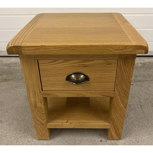 1343 - A modern light oak Sherbourne lamp table with single drawer and undershelf. Metal cup handle. Approx... 