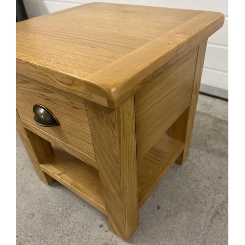 1343 - A modern light oak Sherbourne lamp table with single drawer and undershelf. Metal cup handle. Approx... 