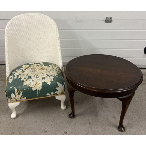 1344 - A vintage Lloyd Loom style basket weave chair with sprung seat, together with a dark oak circular sh... 