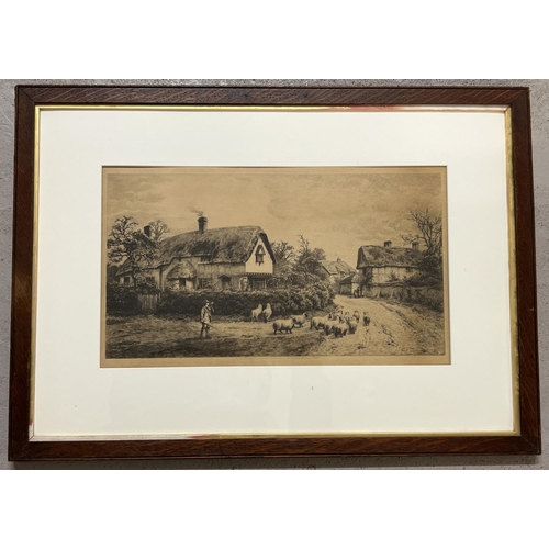 1315 - An antique framed and glazed Fred Slocombe engraving of a shepherd & sheep in a rural village scene.... 