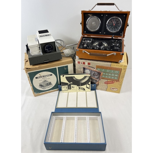 1282 - A boxed vintage Rank Hylite Moth Slide Projector with a vintage slide box. Together with a boxed Avi... 