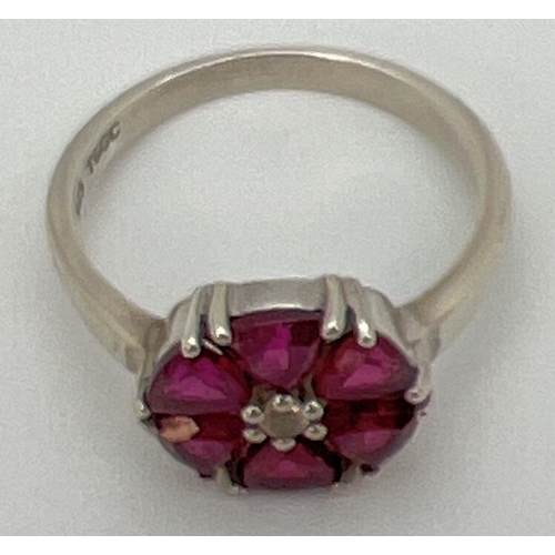 58 - A Genuine Gem Company silver and pink tourmaline dress ring with a circular shaped mount. 6 trillion... 