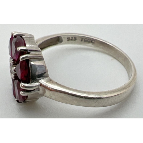 58 - A Genuine Gem Company silver and pink tourmaline dress ring with a circular shaped mount. 6 trillion... 