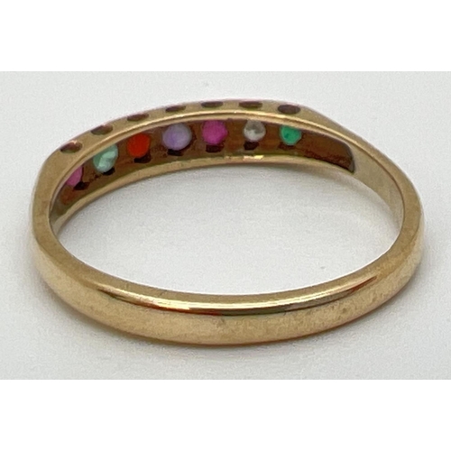 70 - A 9ct gold multi gemstone eternity ring set with rubies, emeralds, diamond, garnet & amethyst. Band ... 