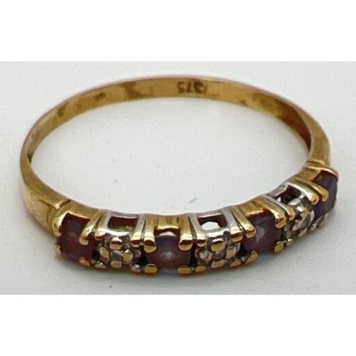 92 - A small 9ct gold eternity ring set with alternating amethysts and diamond chips. Stamped 375 inside ... 