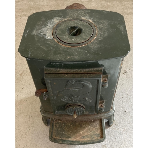 1152 - A vintage L. Lange & Co cast iron wood burner, painted green. Approx. 53cm tall x 38.5cm wide.