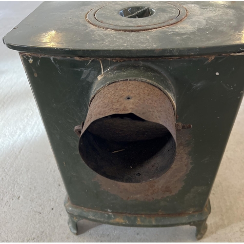 1152 - A vintage L. Lange & Co cast iron wood burner, painted green. Approx. 53cm tall x 38.5cm wide.