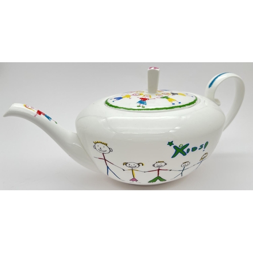 1183 - A ceramic Asprey teapot made exclusively for KIDS Charity Gala evening 2003. Designed by Peter Ting ... 